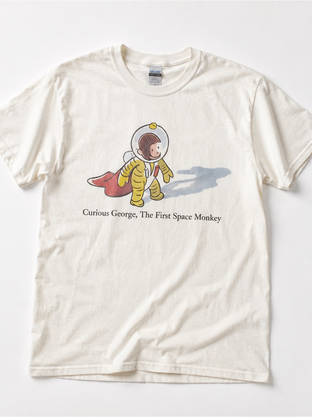 Curious George Cream Graphic T-Shirt - The First Space Monkey